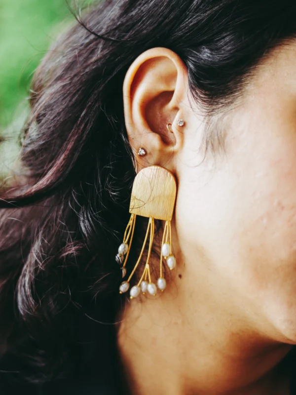 Gold brushed earrings with cascading pearl-like drops – handcrafted statement earrings in matte finish by Twilight by Twinkle